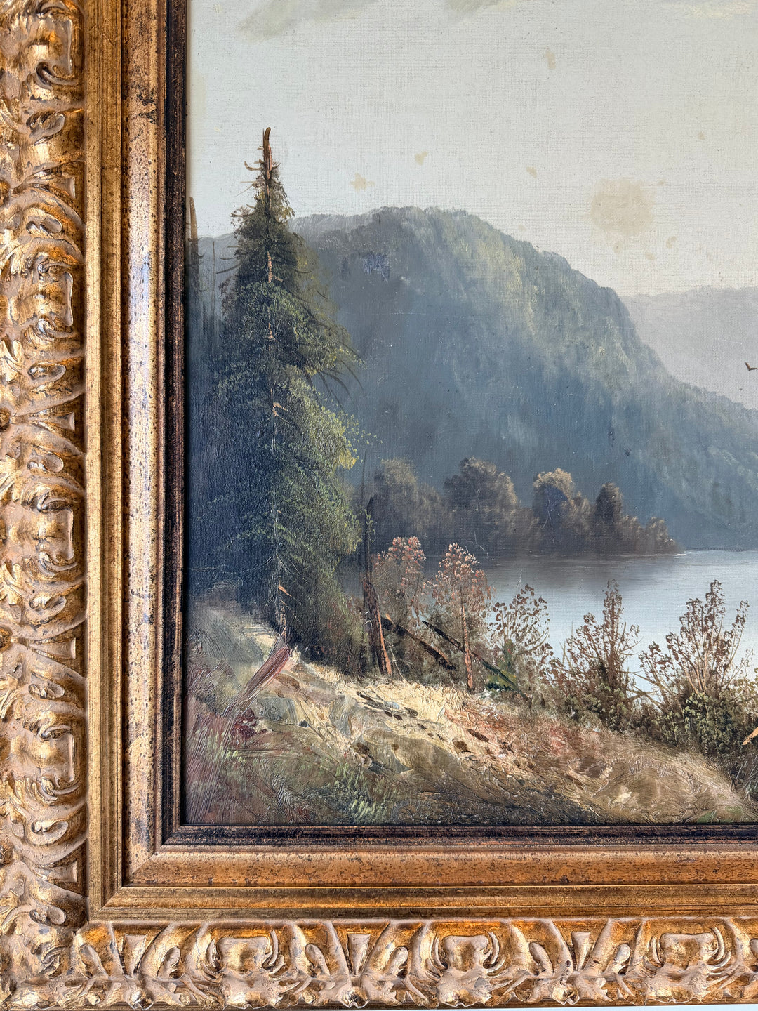 Early 20th century Alpine Stillness mountain lake landscape painting by Housebound Interiors, depicting serene mountain scenery.