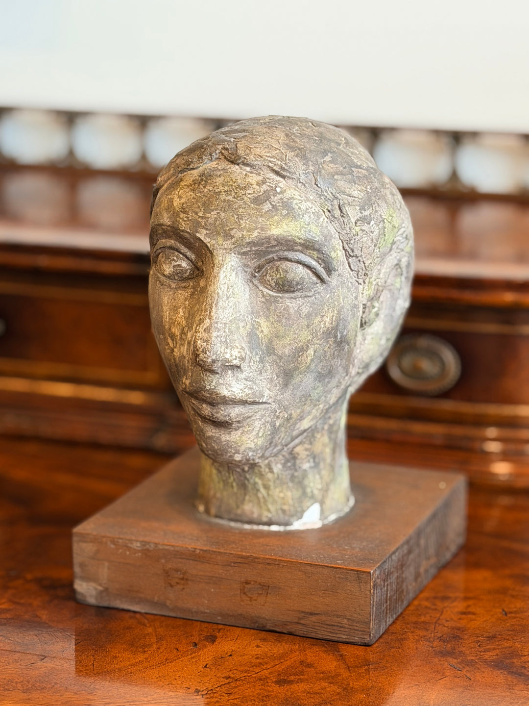 French Modernist Plaster Head Study from the 1950s, showcasing a detailed sculpted head in neutral tones.