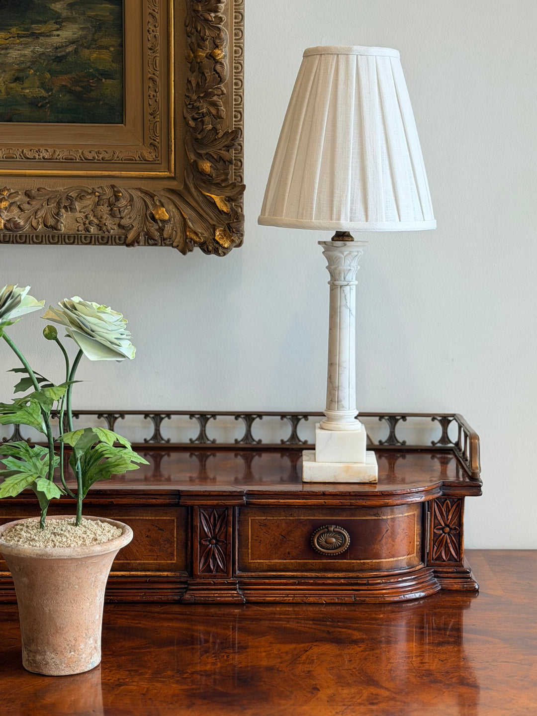 Small Italian marble column table lamp with custom pleated shade, stylish decorative lighting by Housebound Interiors.