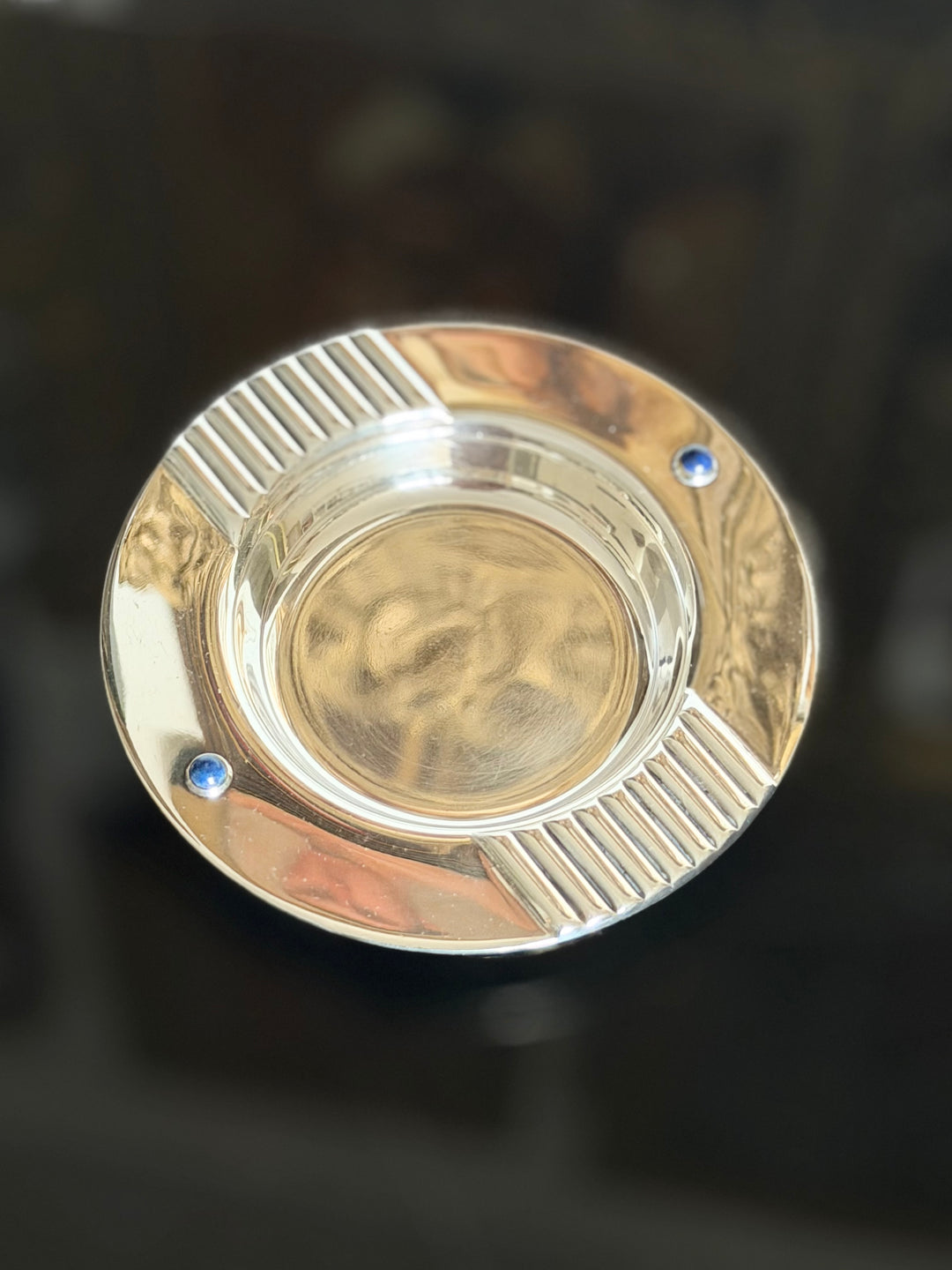 Cartier silver lapis lazuli catchall bowl made in Spain, 20th-century decorative metal dish with vibrant blue lapis accents.