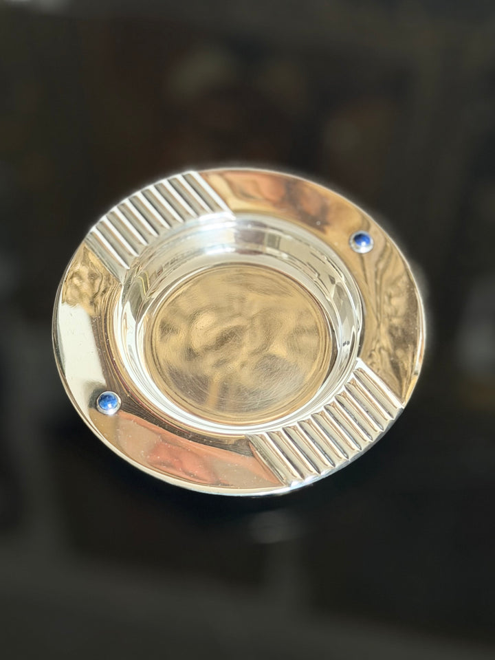 Cartier silver lapis lazuli catchall bowl made in Spain, 20th-century decorative metal dish with vibrant blue lapis accents.
