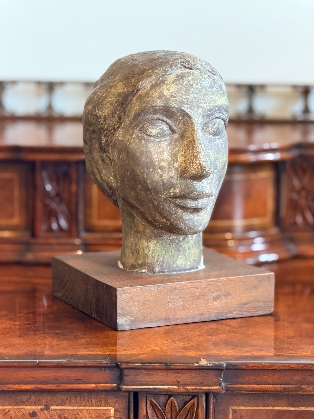 French Modernist plaster head study sculpture from 1950, detailed facial features, displayed on a neutral background.