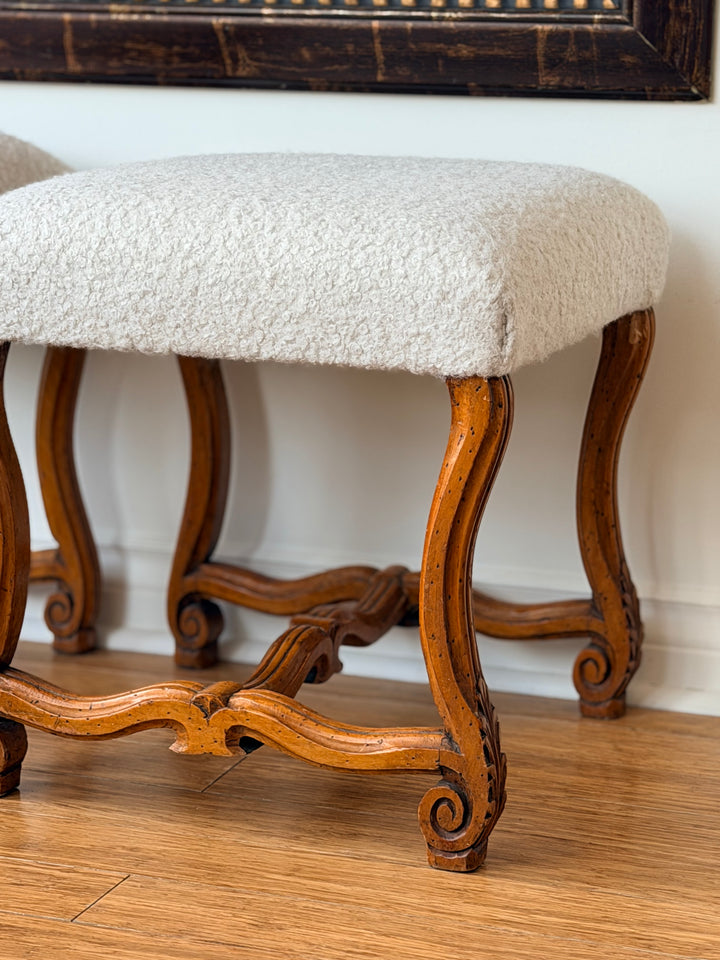 Pair of antique scroll leg stools from Italy with ornate wooden carvings, ideal for vintage interior decor.