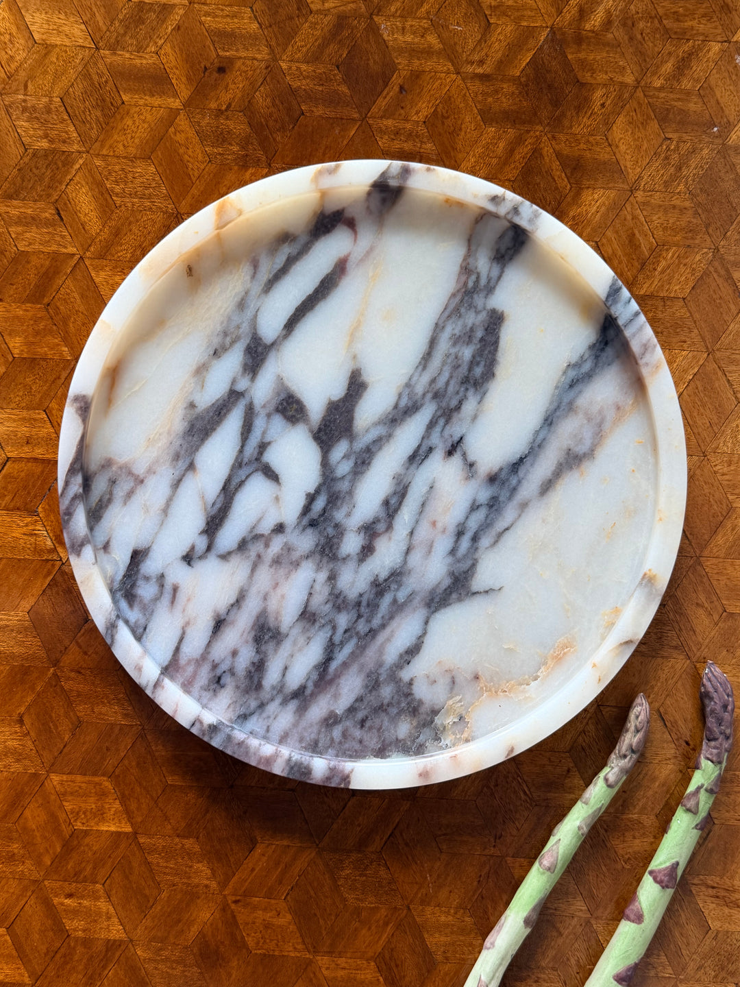 Italian marble catchall by Housebound Interiors, featuring a sleek, polished surface perfect for organizing small items.