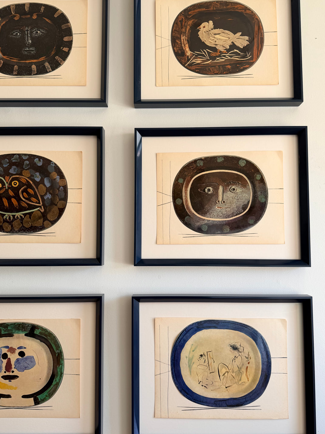 Nine tipped-in color lithographs from Picasso's Céramiques series, showcasing vibrant ceramic-inspired artwork from 1948.