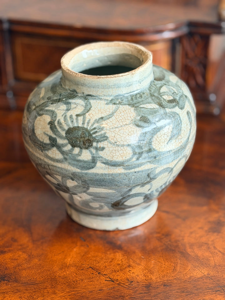 Hand-painted floral ceramic vase from the early 20th century by Housebound Interiors, featuring intricate vintage floral designs.