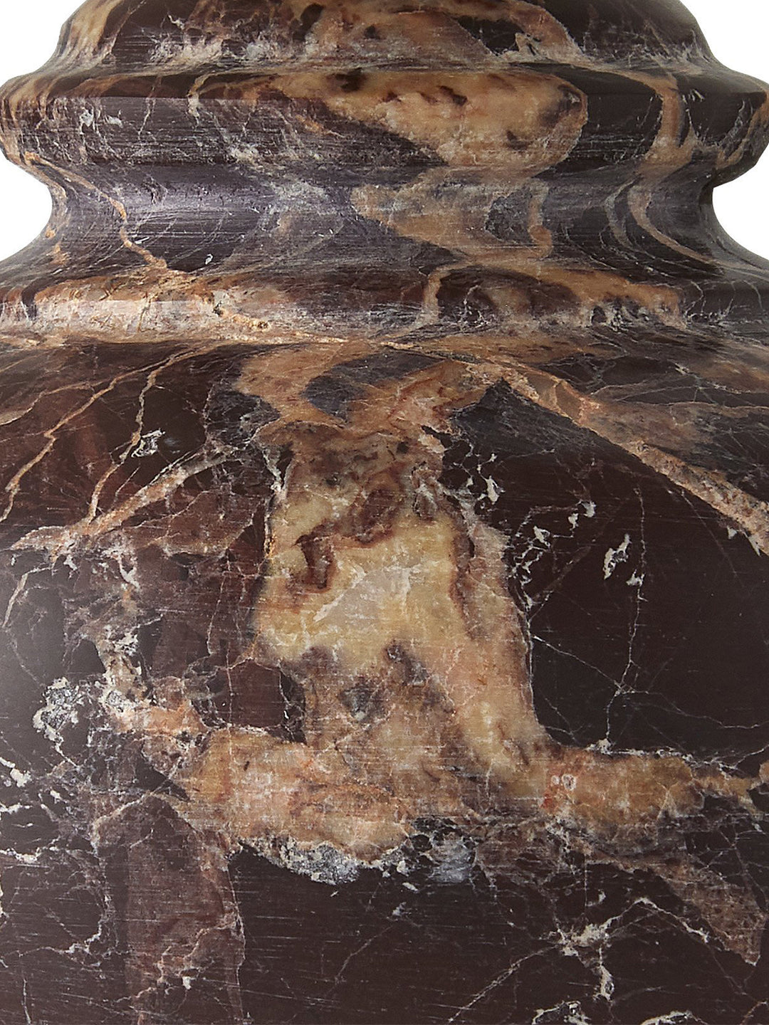 Petite dark brown marble table lamp by Housebound Interiors with a sleek modern design and a cylindrical shape.