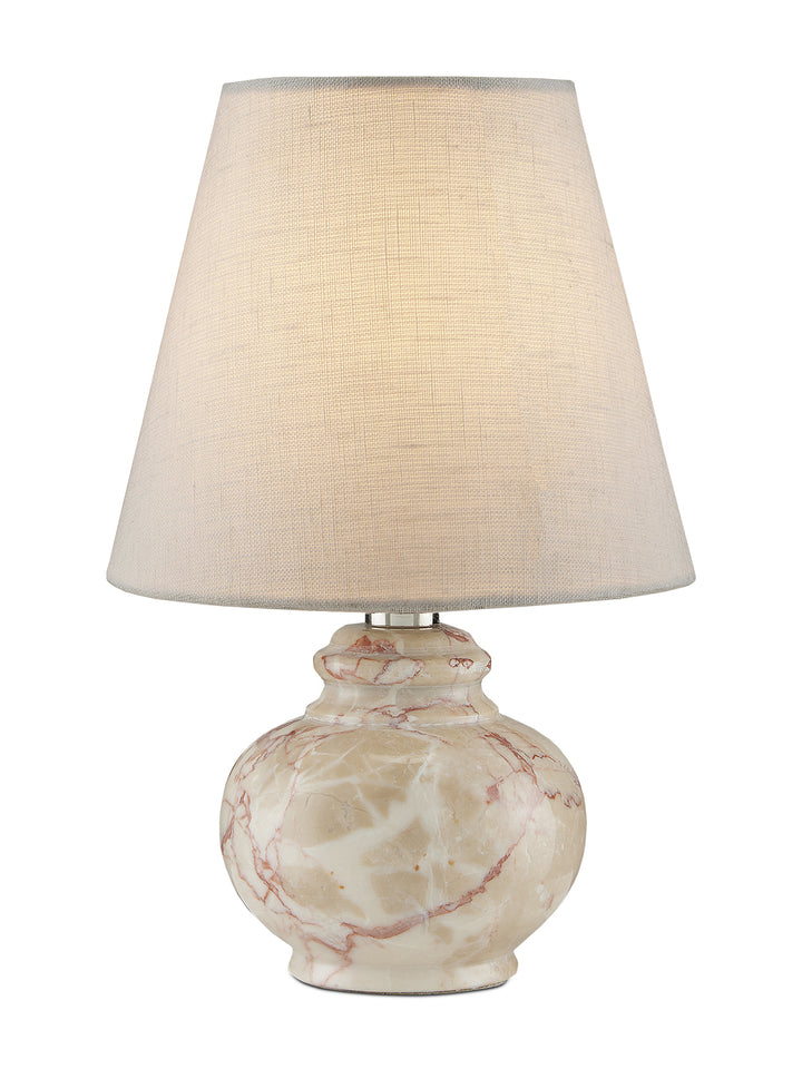 Petite tan marble table lamp by Housebound Interiors with a sleek, modern design and cylindrical shape on a wooden surface.