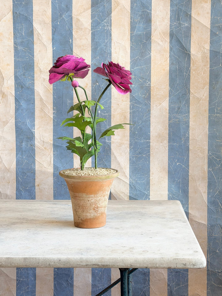 Magenta ranunculus tole sculpture in an aged terracotta pot, decorative floral art piece by Housebound Interiors.