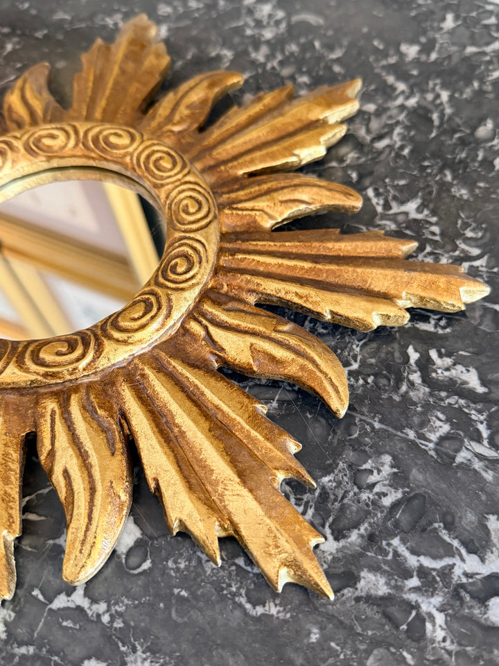Gilt Sunburst Louis XIV Style Mirror with ornate gold frame and intricate design, classic decorative wall mirror.