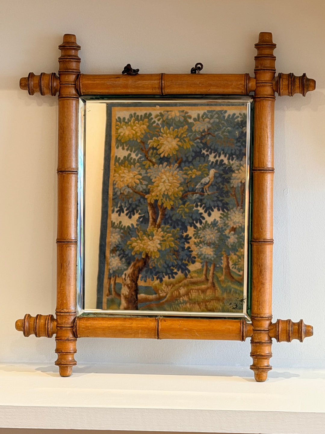 19th Century French faux bamboo wall mirror with intricate carved wood detailing from Housebound Interiors.