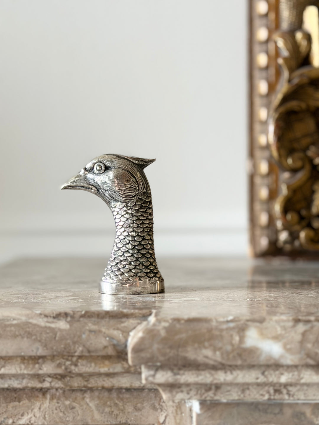Silver bird-shaped bottle opener from the 1950s with sculptural design, by Housebound Interiors.