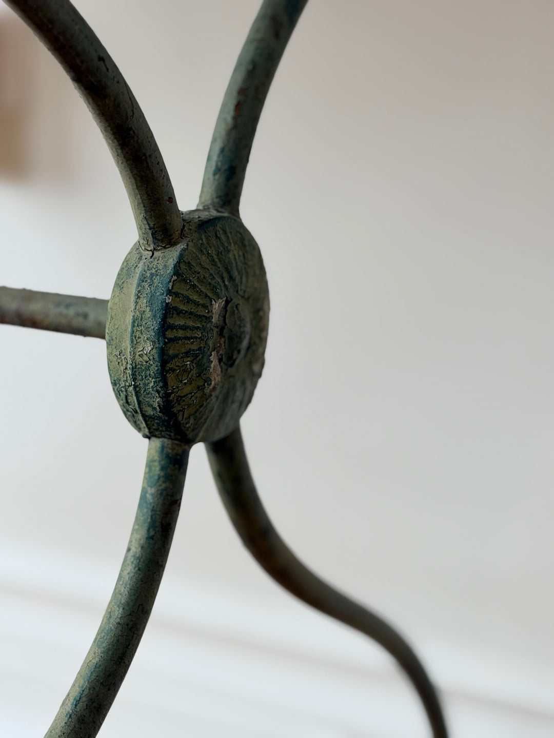 19th-century French iron and marble garden table with intricate ironwork and marble top, vintage outdoor furniture by Housebound Interiors.