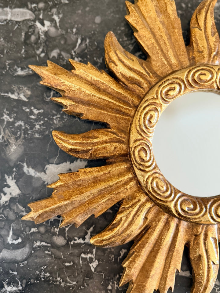 Gilt sunburst Louis XIV style mirror with ornate gold frame and intricate detailing, classic decorative wall mirror by Housebound Interiors