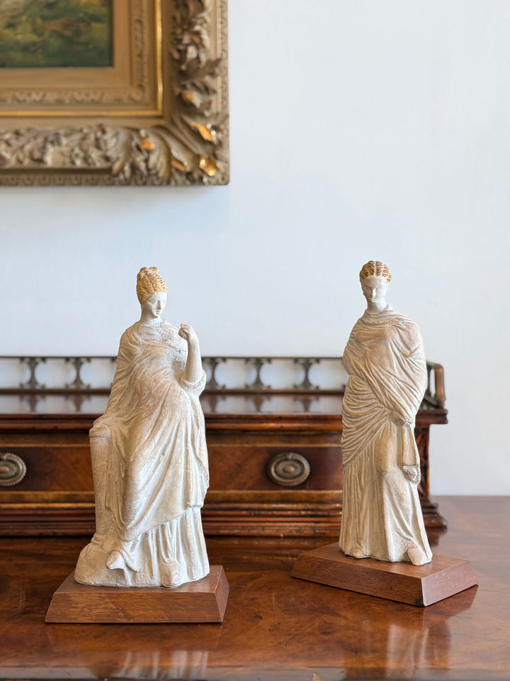 1970s classical female figures plaster casts on wood bases, showcasing draped sculptural art from Housebound Interiors.