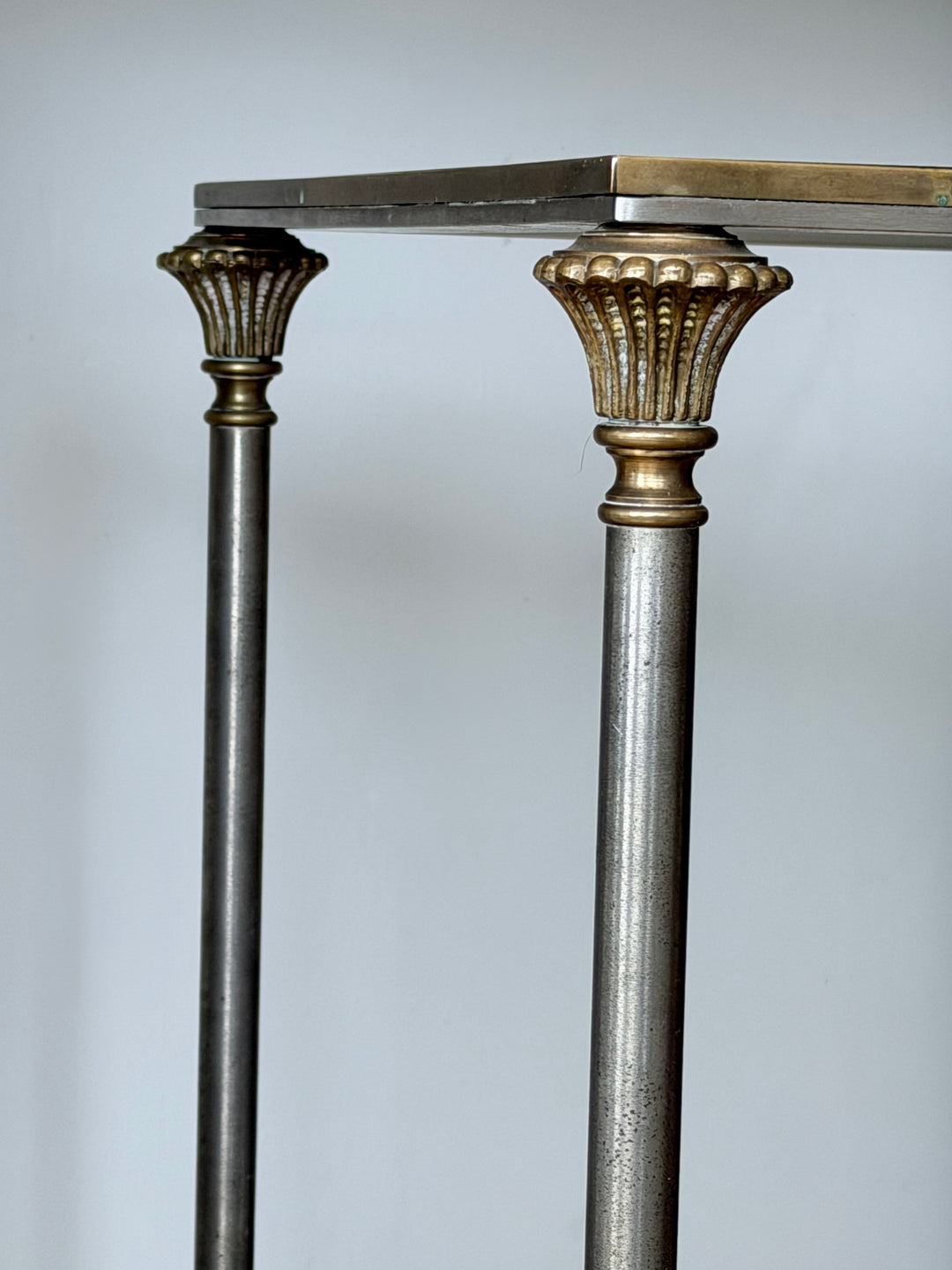 Neoclassical brass and chrome bar cart in the style of Maison Jansen, vintage design with elegant detailing, by Housebound Interiors