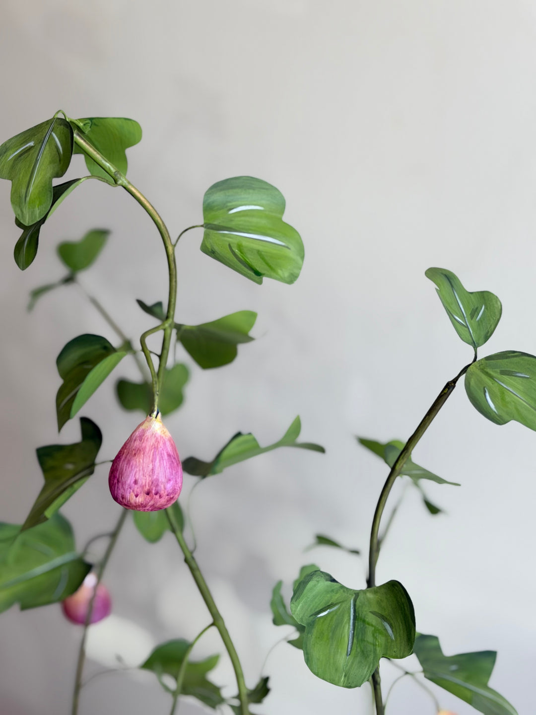 Fig tree tole sculpture in an aged terracotta pot, featuring detailed leaves and branches, by Housebound Interiors.
