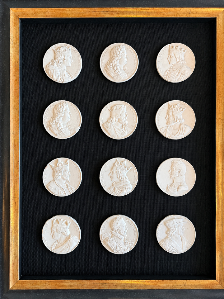 19th-century French royal portrait intaglios featuring intricate carved profiles, displayed on a neutral background.