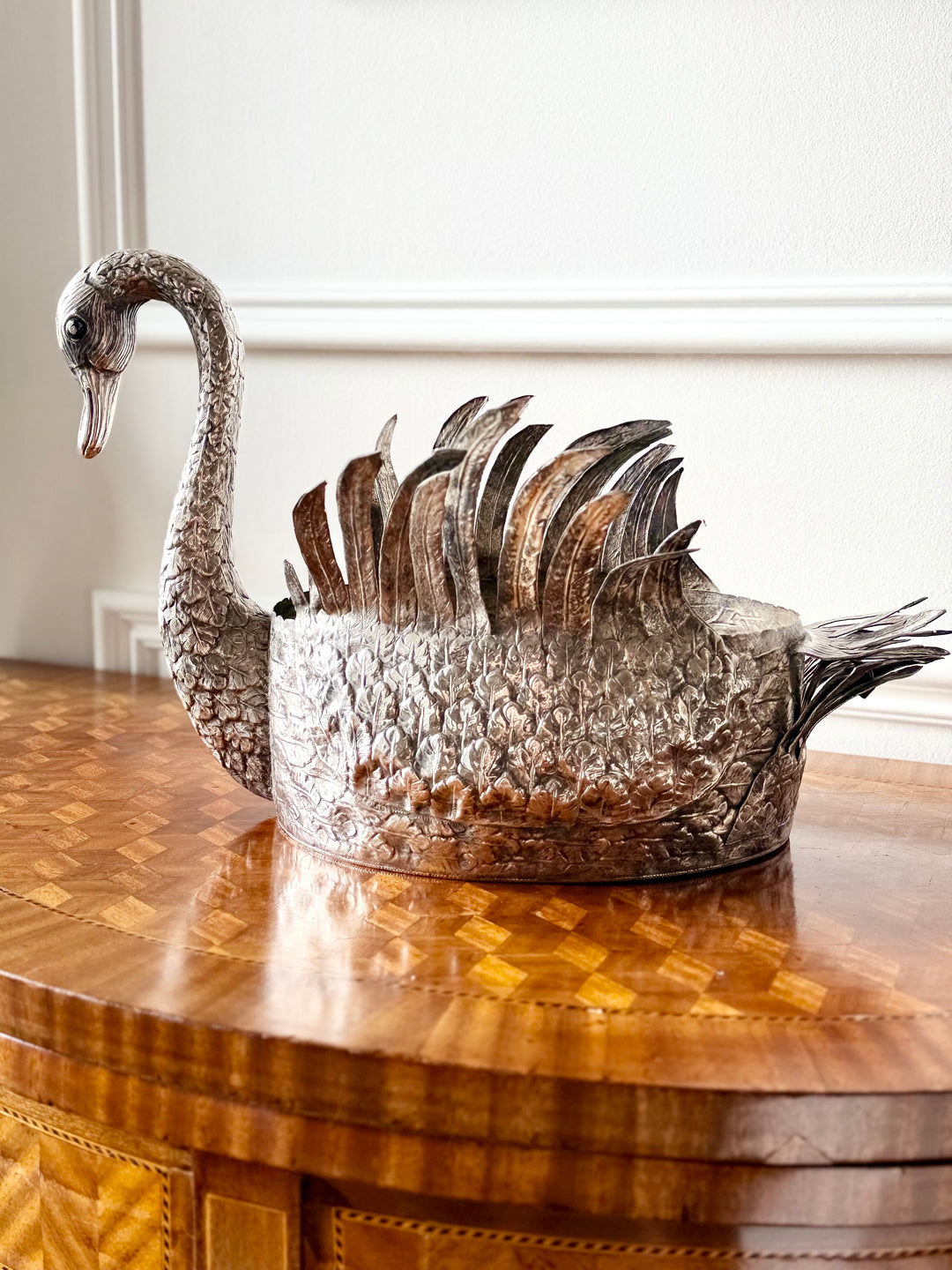 Silver swan-shaped jardinière sculpture from 20th-century Portugal, featuring elegant curves and detailed craftsmanship.