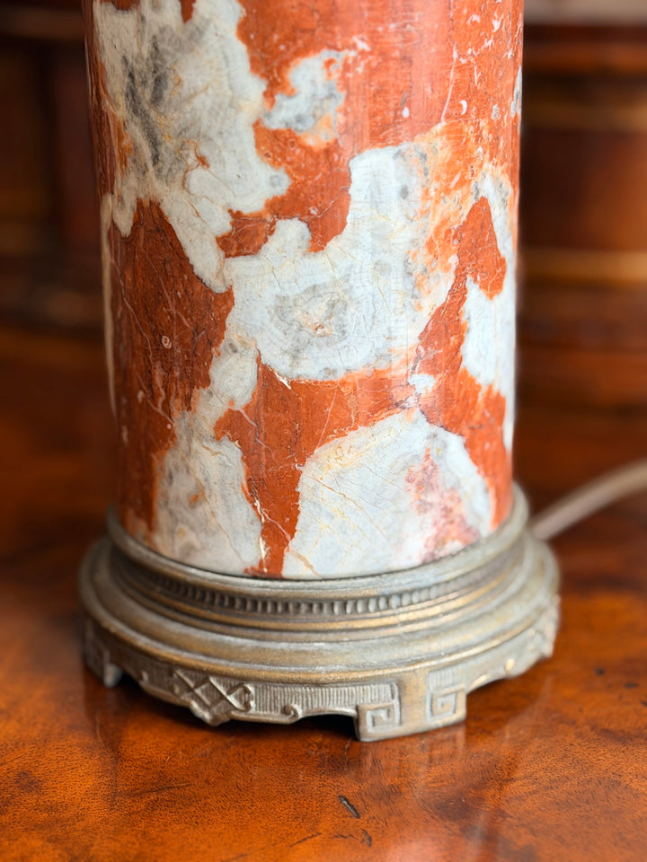 Italian marble column lamps with rouge and ivory finish, featuring custom pleated shades, by Housebound Interiors.