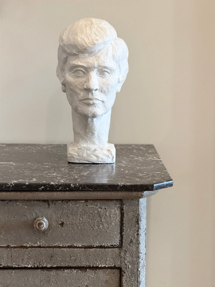 Mid-century modern plaster female bust sculpture by Housebound Interiors, featuring detailed facial features and a smooth finish.