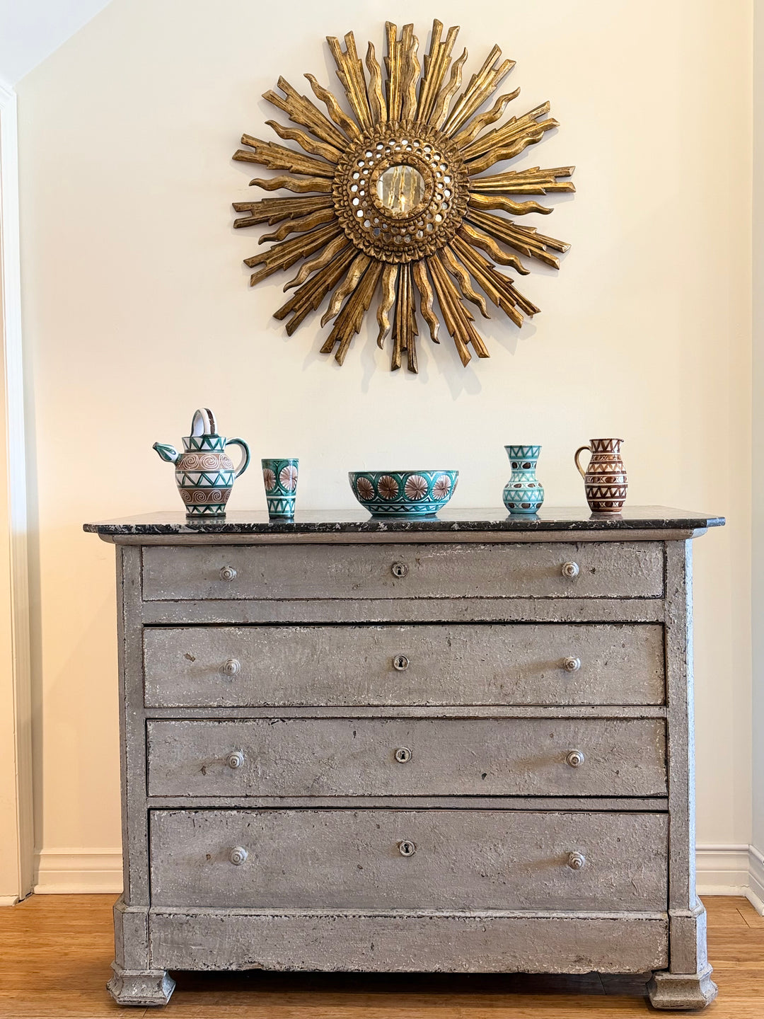 19th century French painted commode with marble top, showcasing ornate design and antique wood finish by Housebound Interiors