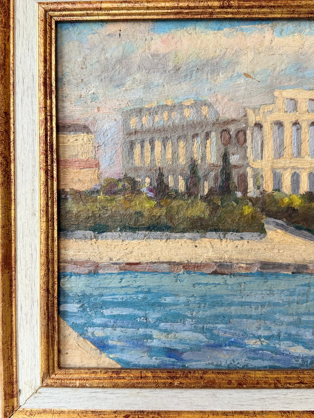 Early Impressionist oil painting of the Roman Amphitheatre in Pula, Croatia, on a wooden board, created around 1940.