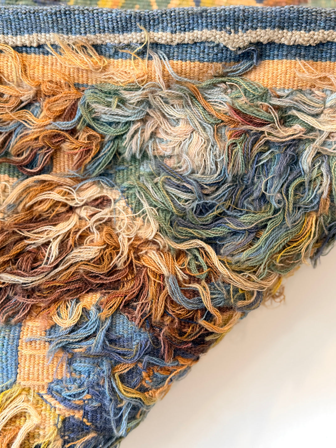 Early 20th Century French verdure tapestry featuring birds and a serene countryside landscape scene.