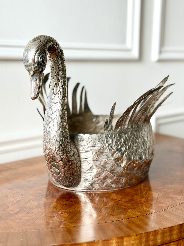 Silver sculptural swan jardinière from 20th-century Portugal with elegant, flowing form and detailed craftsmanship.
