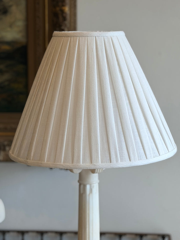Large Italian marble column table lamp with custom pleated linen shade, elegant decorative lighting from Housebound Interiors.