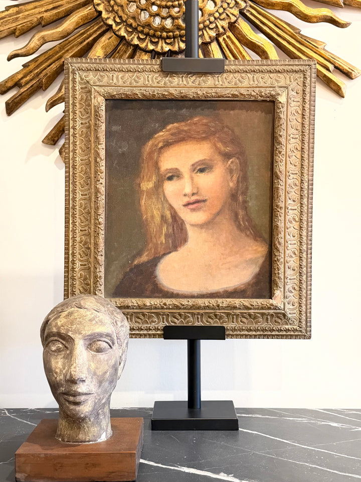 Vintage 1930s American school portrait of a young woman in carved wooden frame, displayed as wall art.