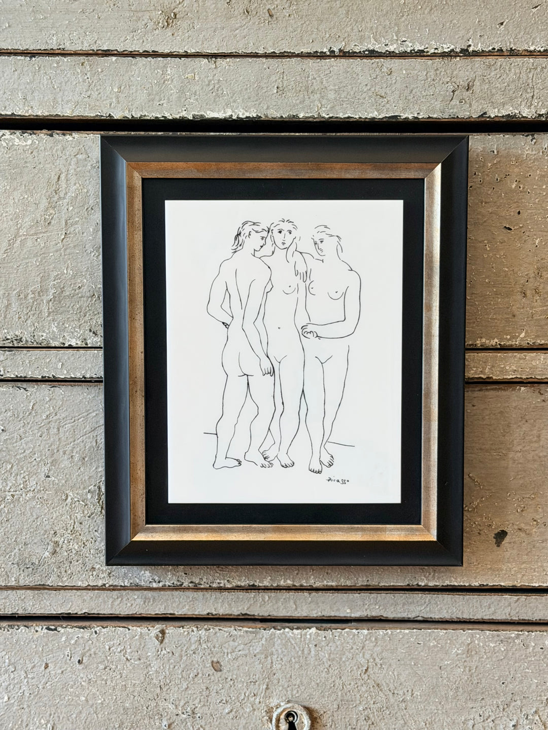 Colorful 1970s Les Trois Grâces artwork by Pablo Picasso displayed in a frame, showcasing vibrant abstract figures.
