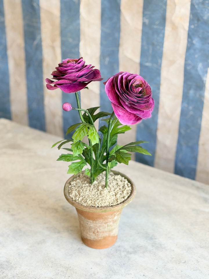 Ranunculus Tole sculpture in aged terracotta pot with magenta flowers, decorative Housebound Interiors floral art piece.