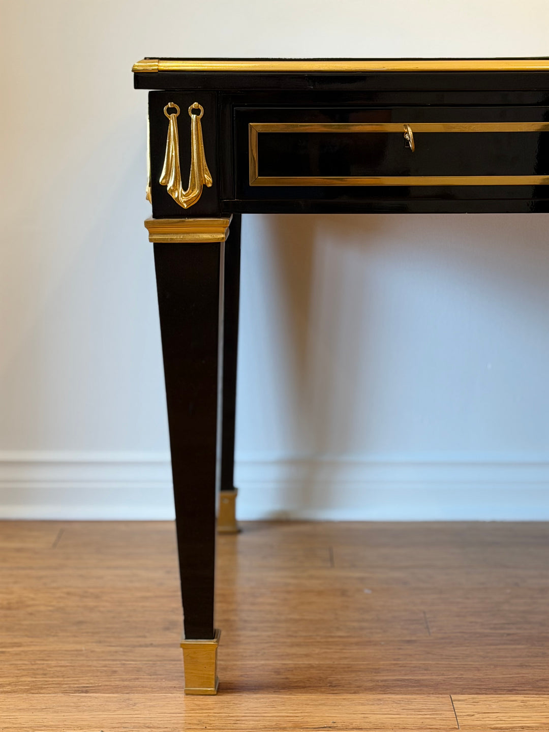 Spanish Neoclassical Ebonized Desk with Gilt Metal Mounts and Tooled Leather Top