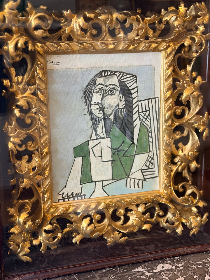 Seated female portrait artwork by Pablo Picasso from 1953, displayed in a frame, part of Housebound Interiors' art collection.