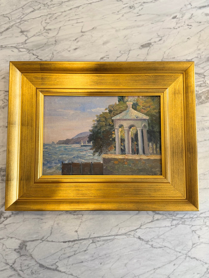 20th-century French coastal landscape painting by Housebound Interiors featuring a neoclassical pavilion and seaside scenery.