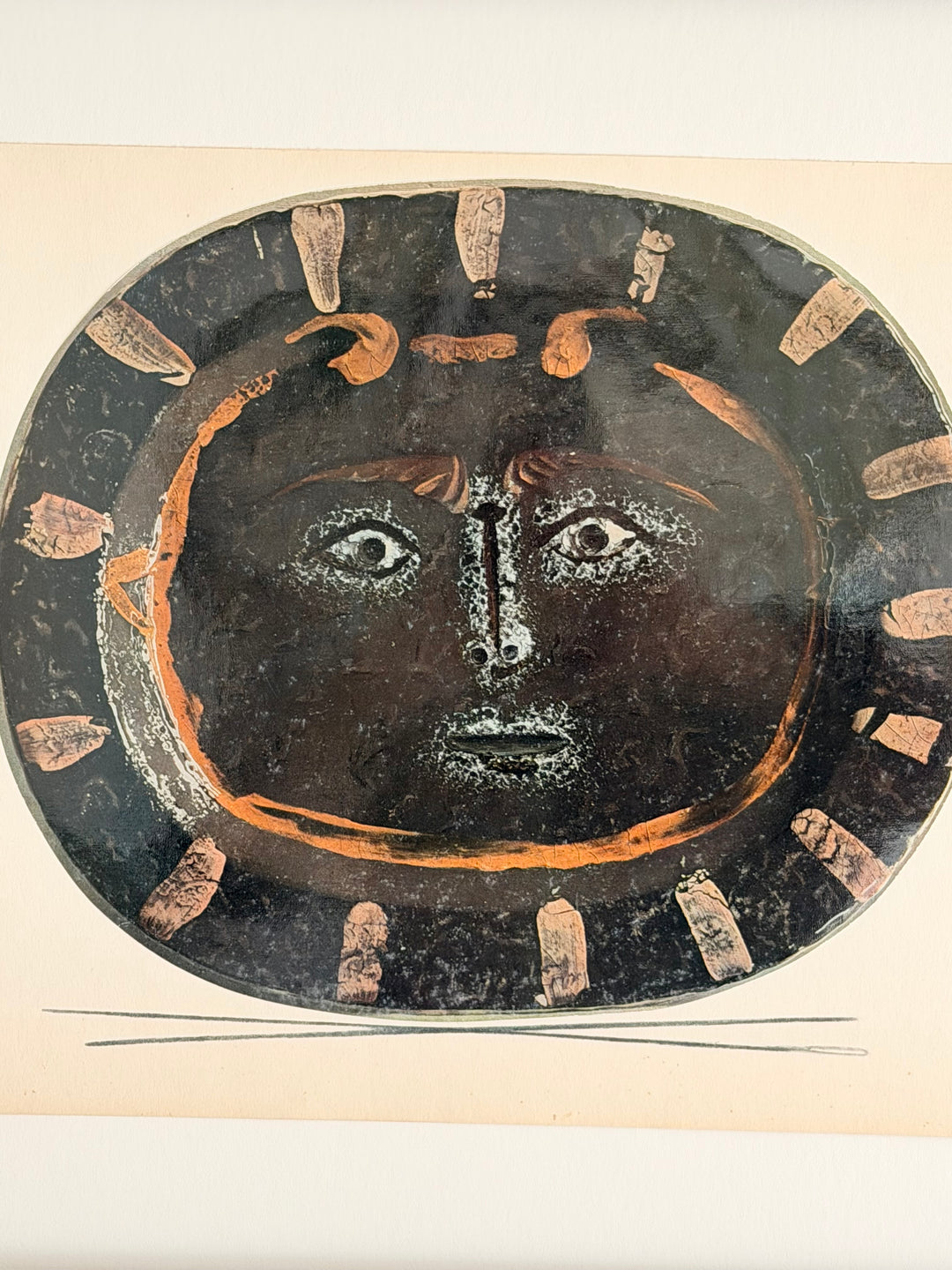 Nine tipped-in color lithographs from Céramiques de Picasso, 1948, showcasing vibrant ceramic designs by Pablo Picasso.