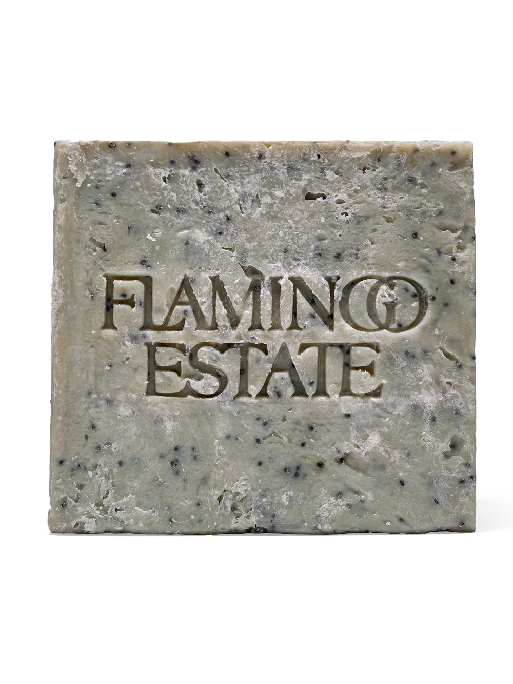 Housebound Interiors Flamingo Estate Morning Exfoliating Peppermint Soap Brick with textured surface and bright peppermint scent.