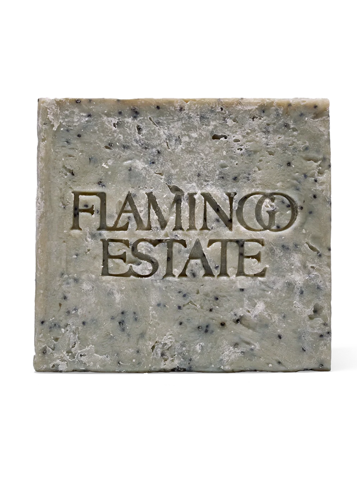 Housebound Interiors Flamingo Estate Morning Exfoliating Peppermint Soap Brick with textured surface and bright peppermint scent.