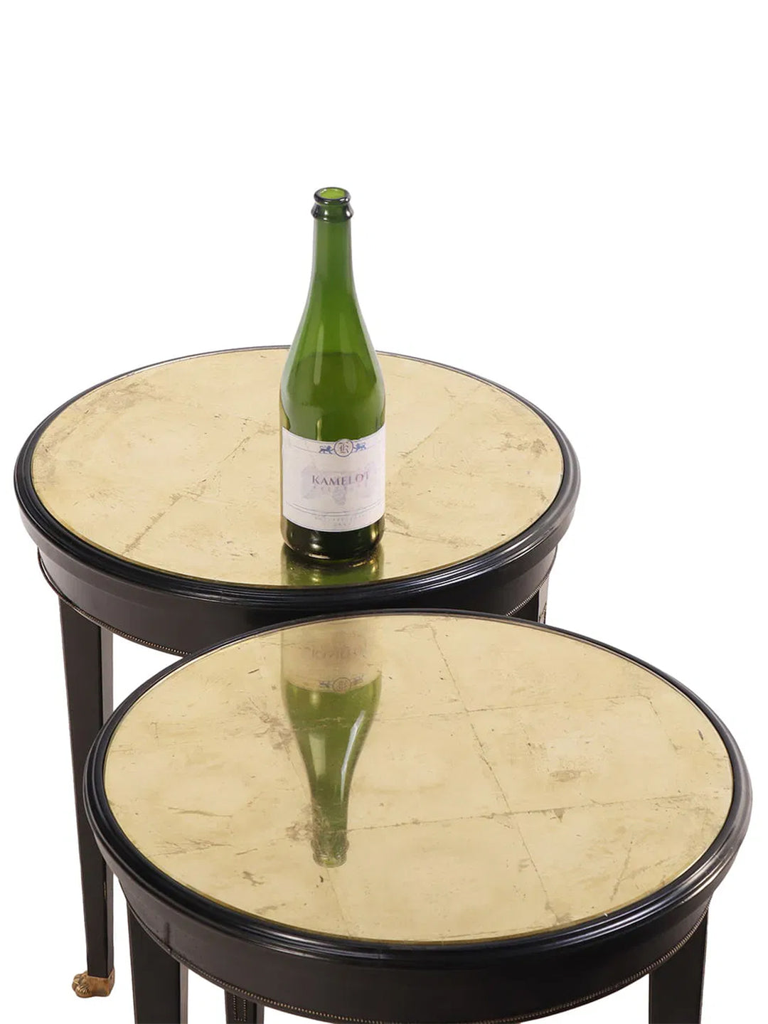 Pair of 1950s Italian ebonized side tables with gilt glass tops and brass claw feet, classic vintage accent furniture